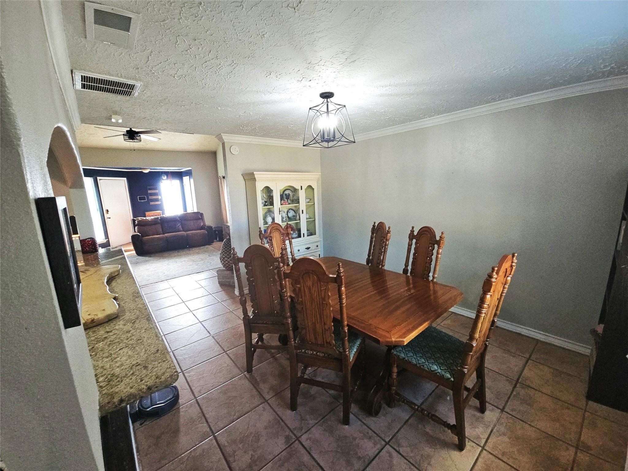 24014 Red Sky Drive Spring, TX 77373 - Photo 16 of 23 a view of a dining room with furniture