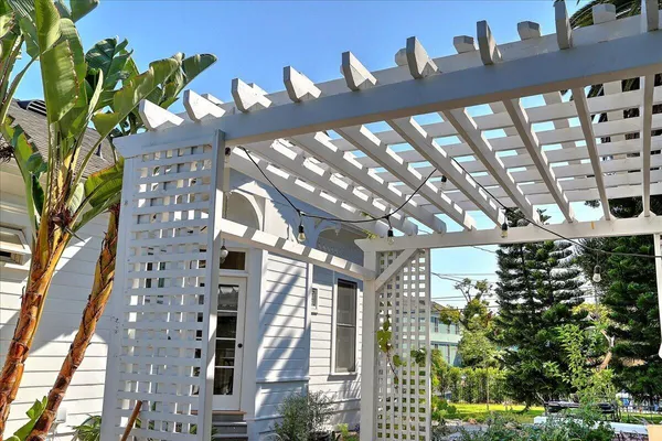 a view of balcony with furniture
