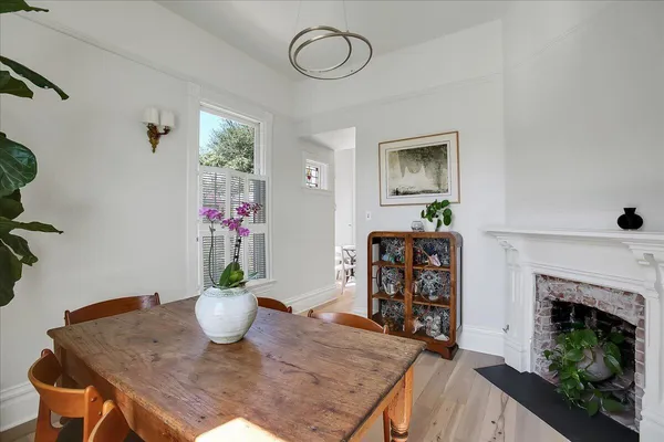 a kitchen with stainless steel appliances a stove a sink and a refrigerator
