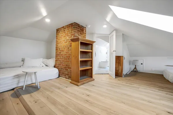 a bathroom with a shower and a toilet
