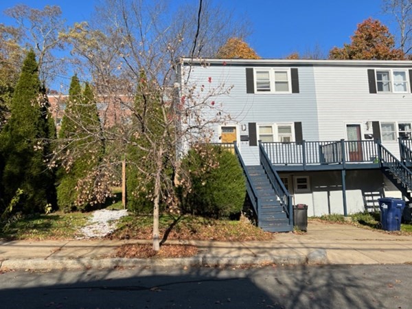 45 Lawn Street, Unit PE Boston, MA 02120 - Photo 14 of 26 a front view of a house with garden