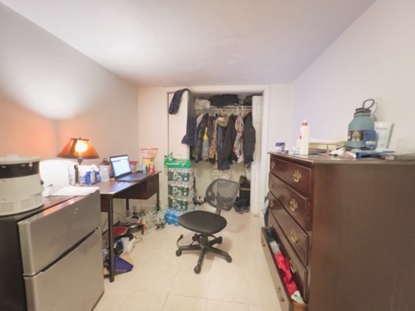 45 Lawn Street, Unit PE Boston, MA 02120 - Photo 21 of 26 a view of a workspace with furniture