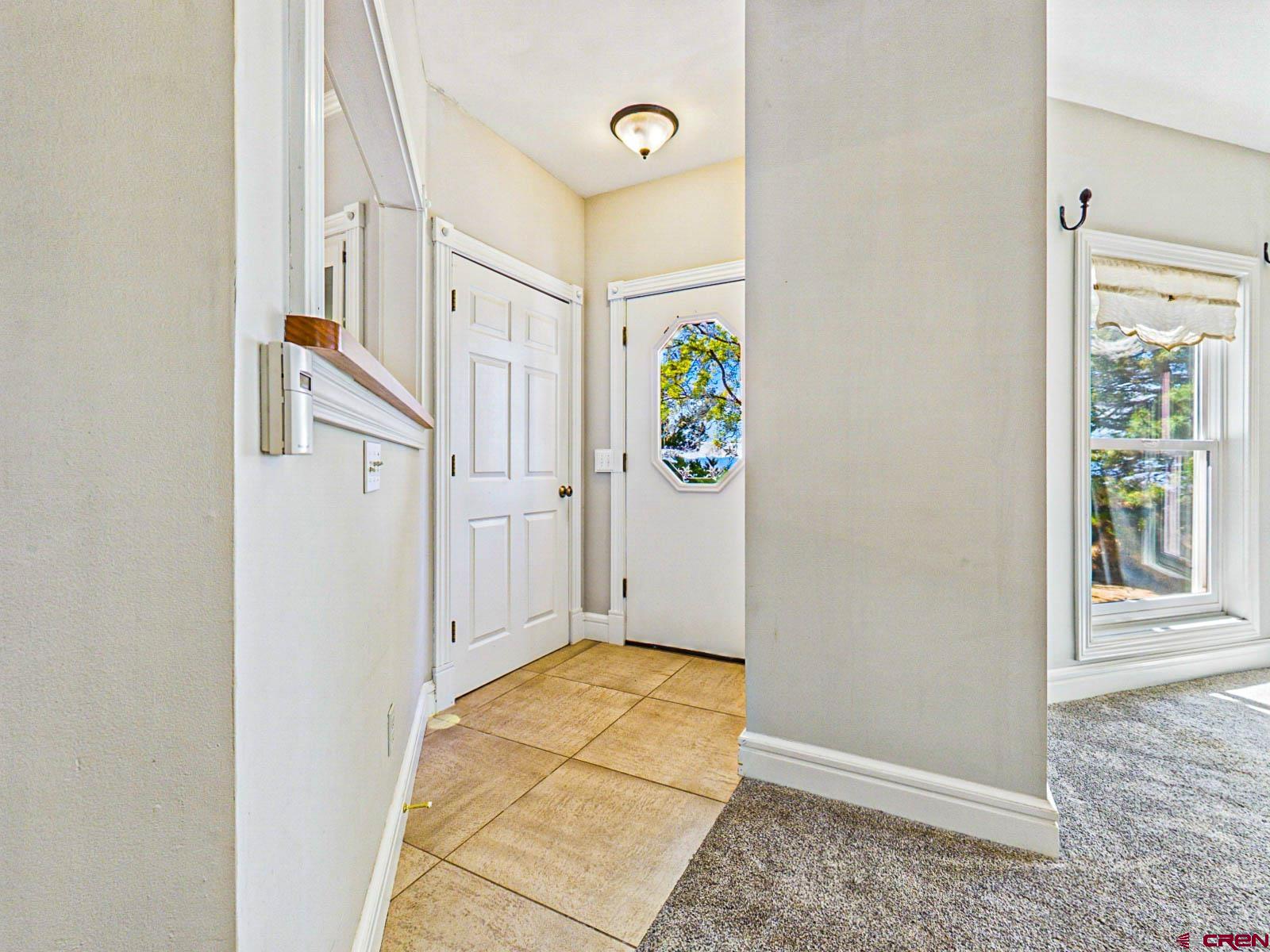 16331 2550th Road Cedaredge, CO 81413 - Photo 10 of 45 a view of an entryway with wooden floor