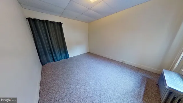 an empty room with window