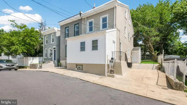 a front view of a house with a patio