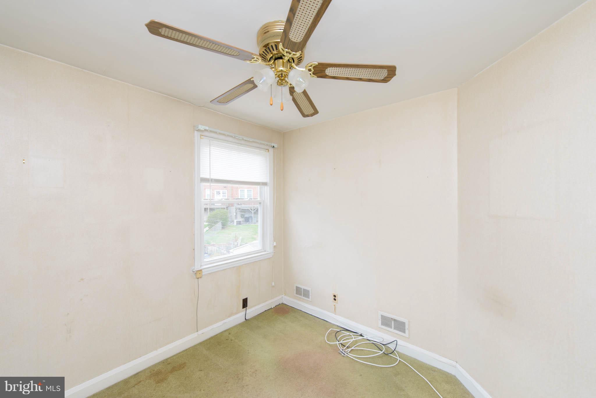1103 Granville Road Baltimore, MD 21207 - Photo 17 of 29 Hardwood Floors under carpet