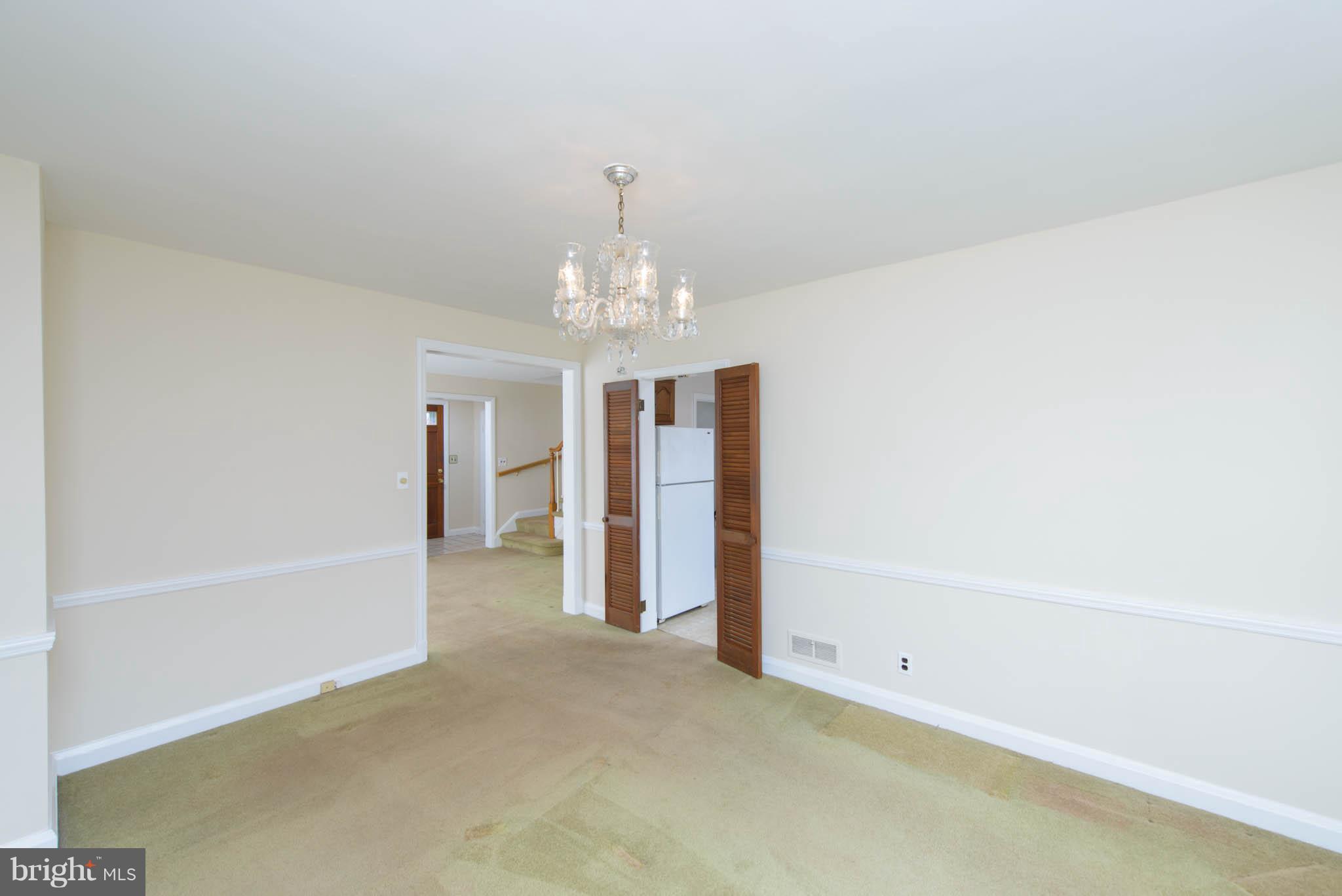 1103 Granville Road Baltimore, MD 21207 - Photo 9 of 29 Hardwood Floors under carpet
