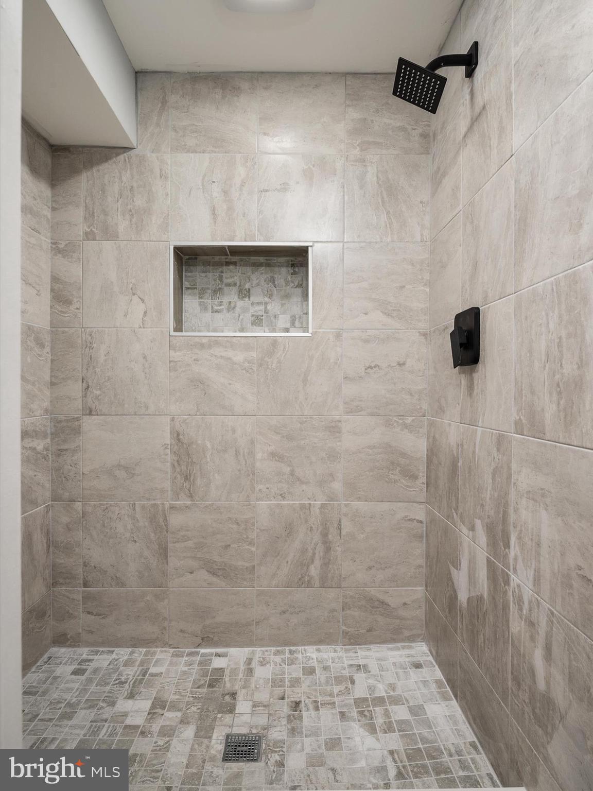 5002 Silver Hill Road Suitland, MD 20746 - Photo 29 of 39 a bathroom with a shower