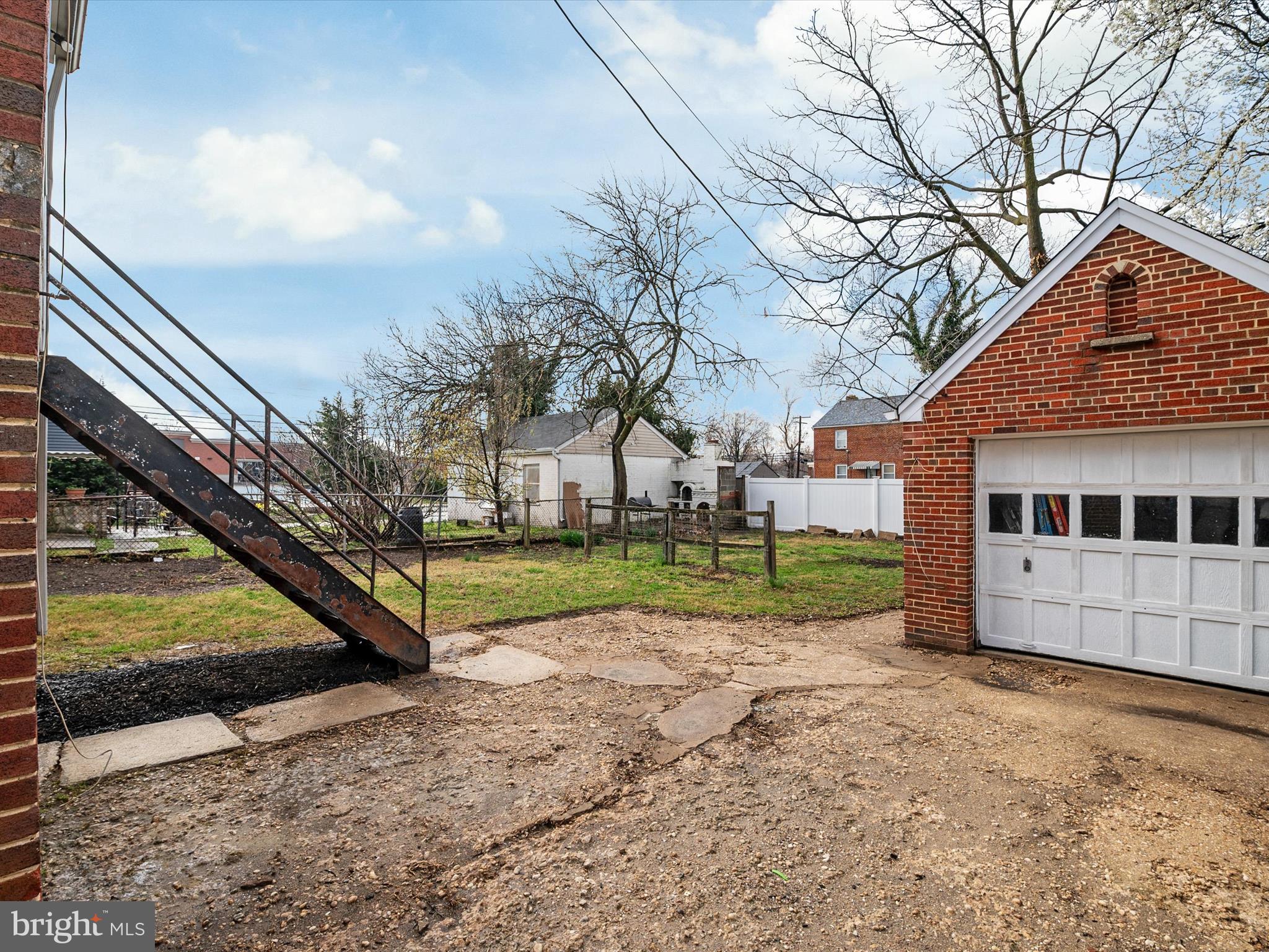 5002 Silver Hill Road Suitland, MD 20746 - Photo 34 of 39 a view of a house with a yard