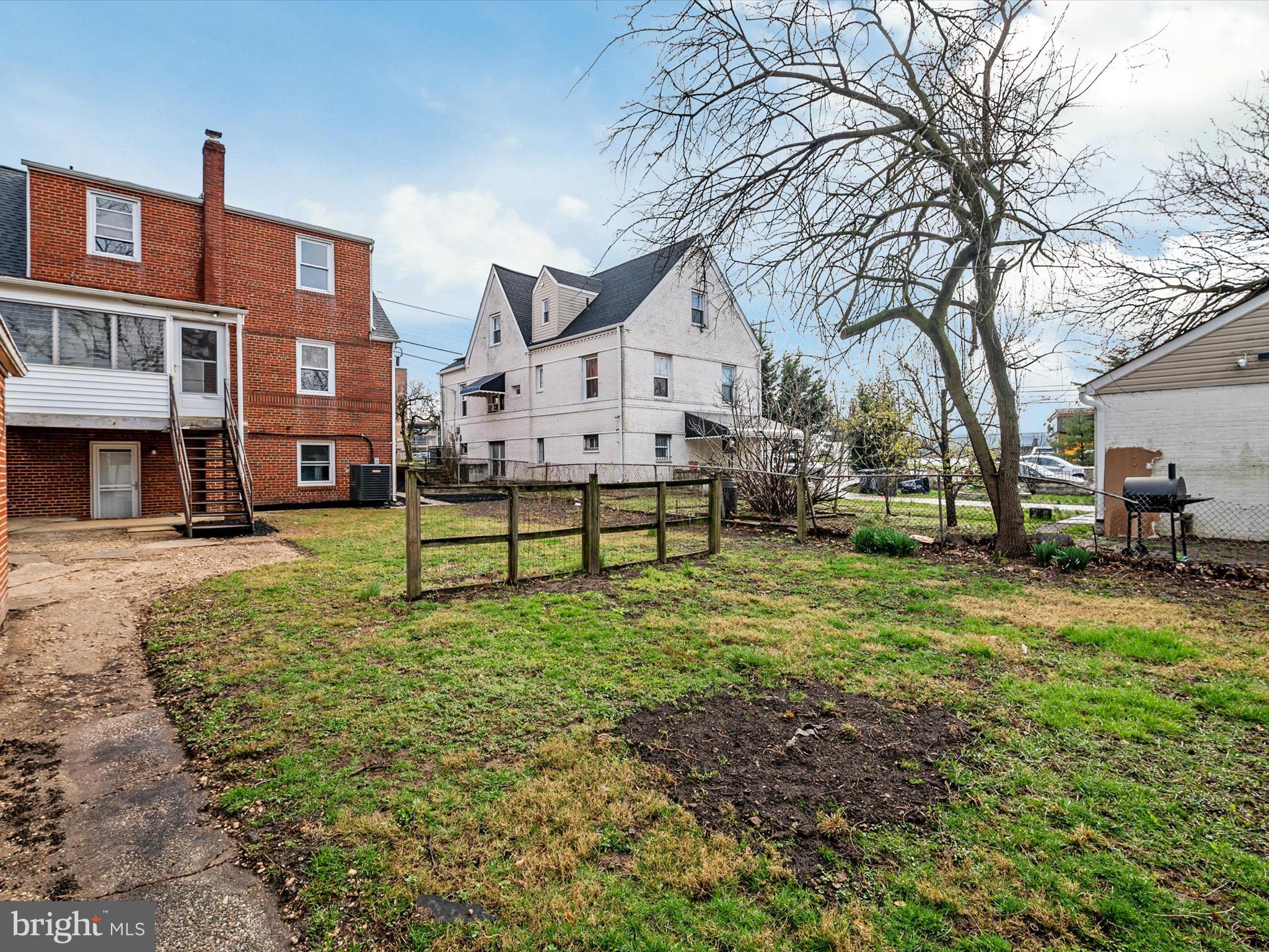 5002 Silver Hill Road Suitland, MD 20746 - Photo 35 of 39 a view of a house with a yard