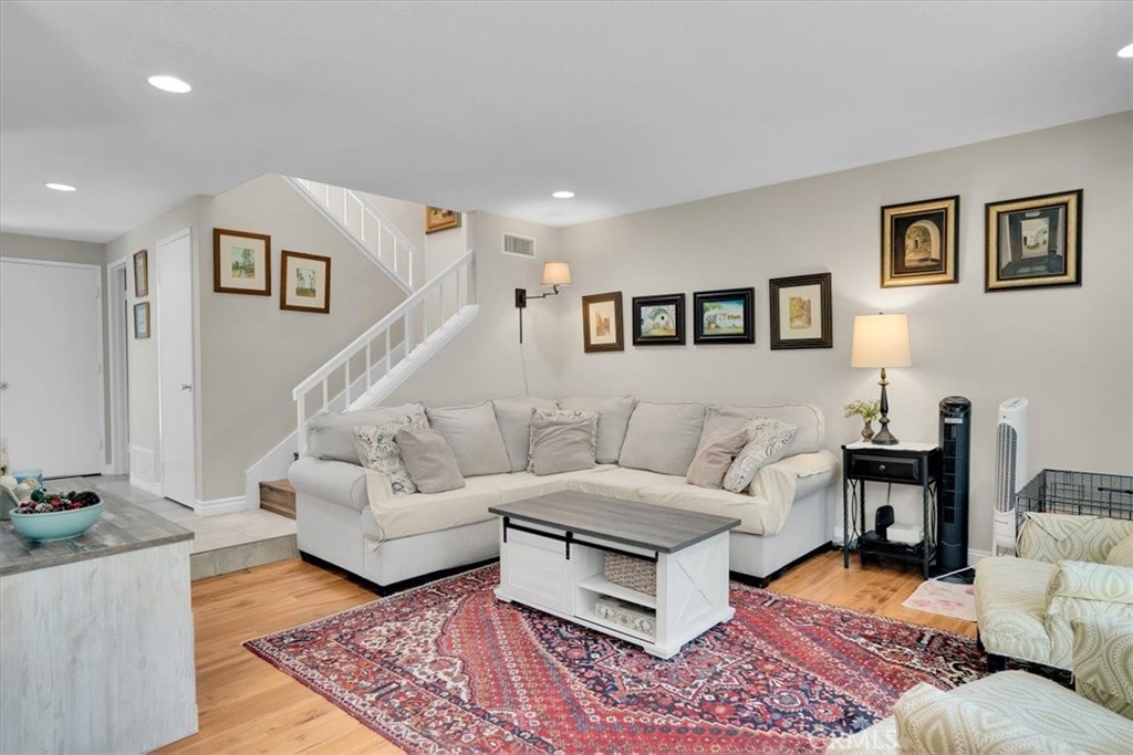 12 Sparrow Hill Lane Laguna Hills, CA 92653 - Photo 20 of 45 a living room with furniture and a couch