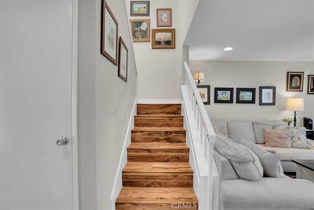 12 Sparrow Hill Lane Laguna Hills, CA 92653 - Photo 2 of 45 a view of entryway and hall with wooden floor
