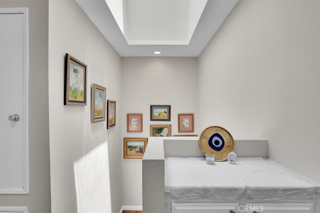 12 Sparrow Hill Lane Laguna Hills, CA 92653 - Photo 28 of 45 a view of a livingroom with a stove and a microwave