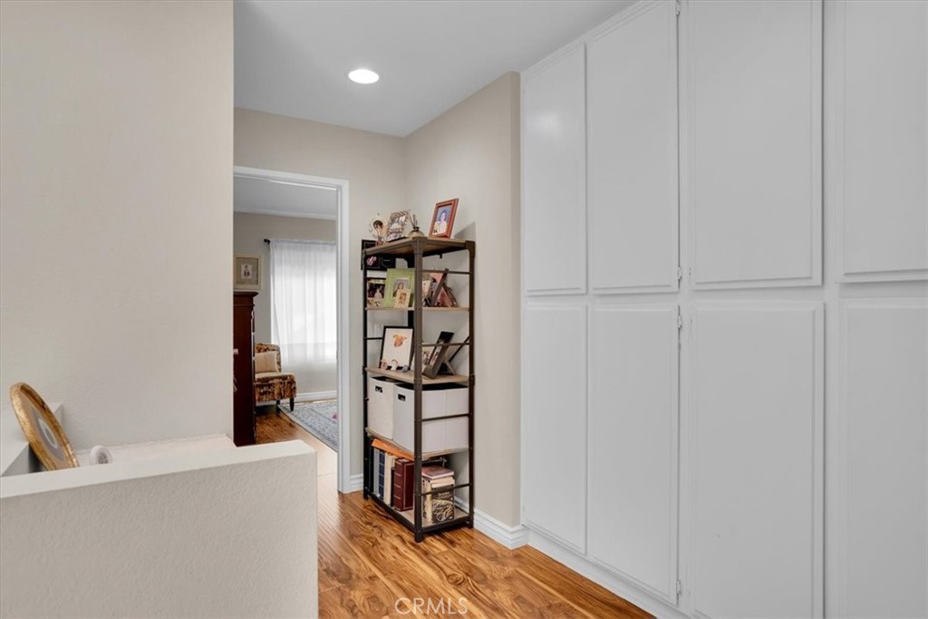 12 Sparrow Hill Lane Laguna Hills, CA 92653 - Photo 29 of 45 a view of walk in closet with clothes and shoes