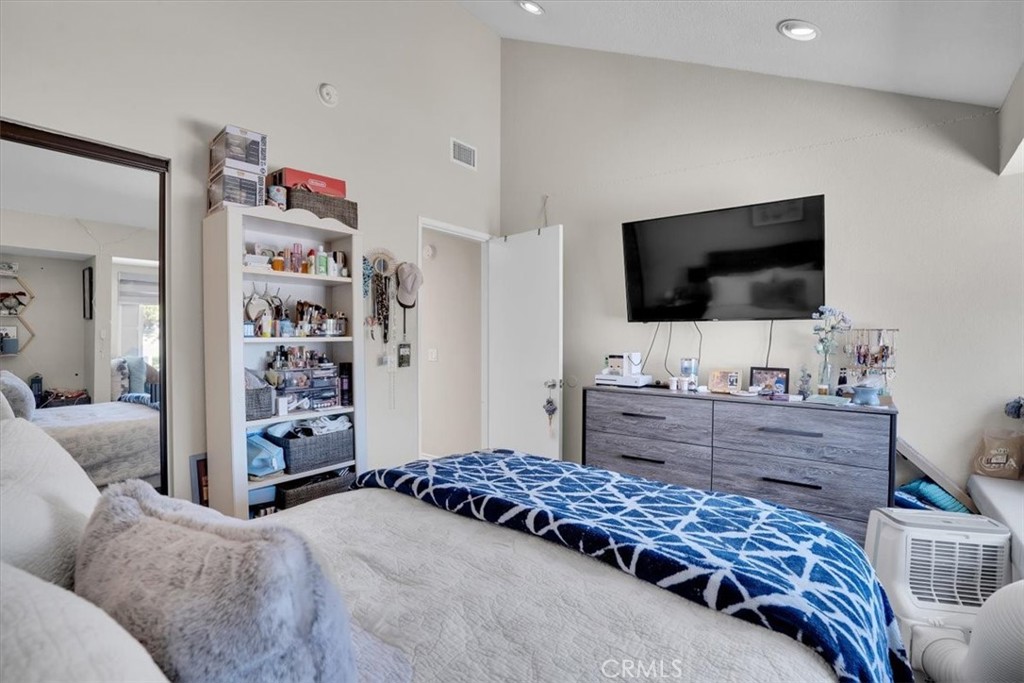 12 Sparrow Hill Lane Laguna Hills, CA 92653 - Photo 34 of 45 a bedroom with a bed and a flat screen television