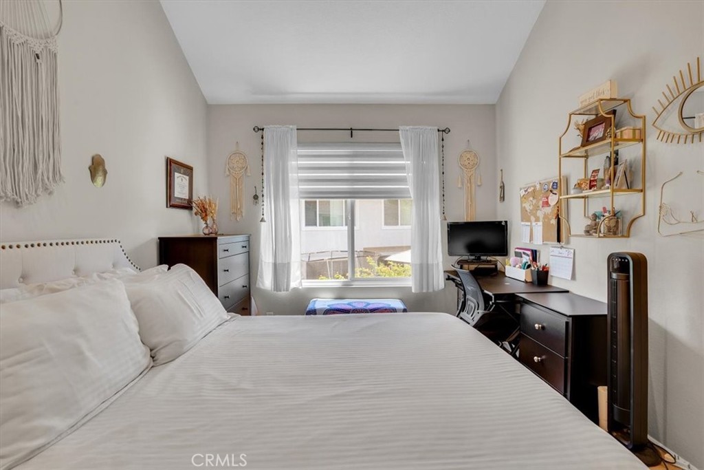 12 Sparrow Hill Lane Laguna Hills, CA 92653 - Photo 36 of 45 a bedroom with a bed and a flat screen tv