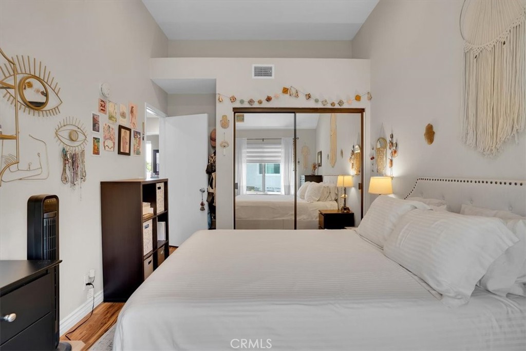 12 Sparrow Hill Lane Laguna Hills, CA 92653 - Photo 37 of 45 a bedroom with a large bed and a large window