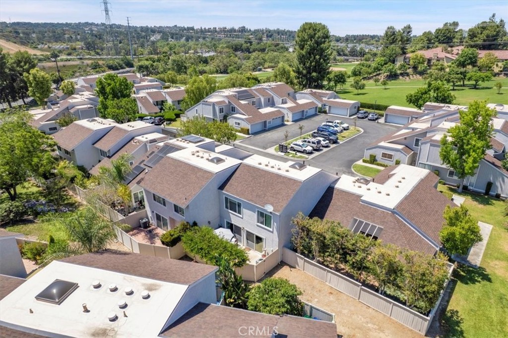12 Sparrow Hill Lane Laguna Hills, CA 92653 - Photo 8 of 45 an aerial view of a house with a garden