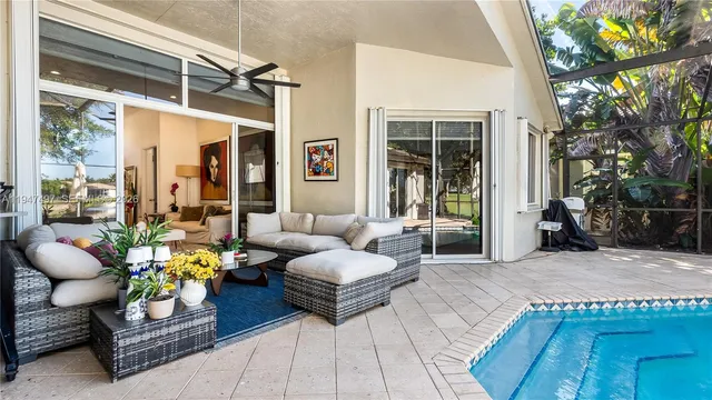 a view of a swimming pool with a patio