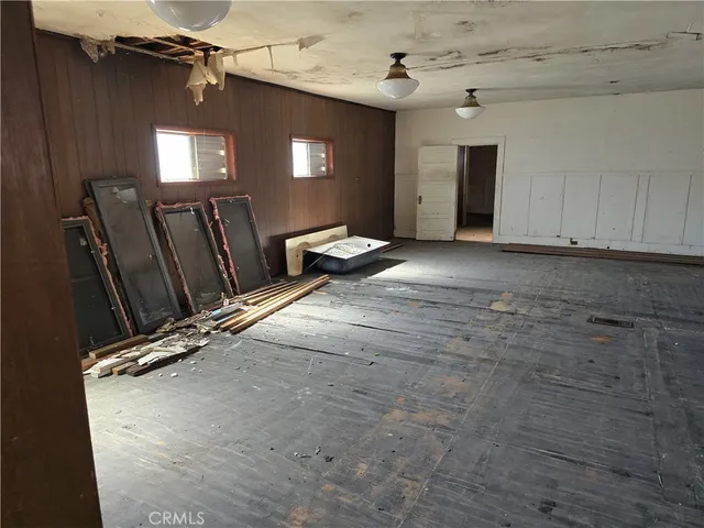 a view of a livingroom with a staircase