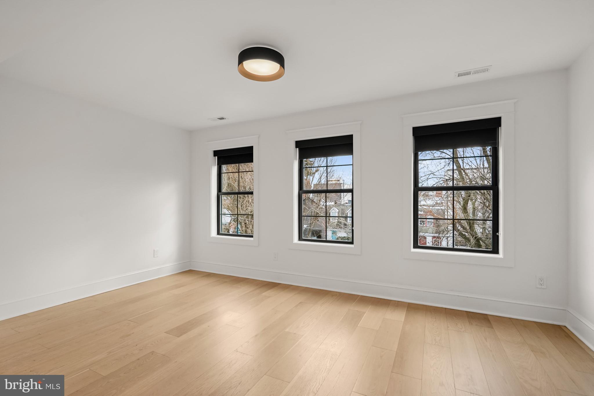 3719 R Street Northwest Washington, DC 20007 - Photo 24 of 44 an empty room with windows