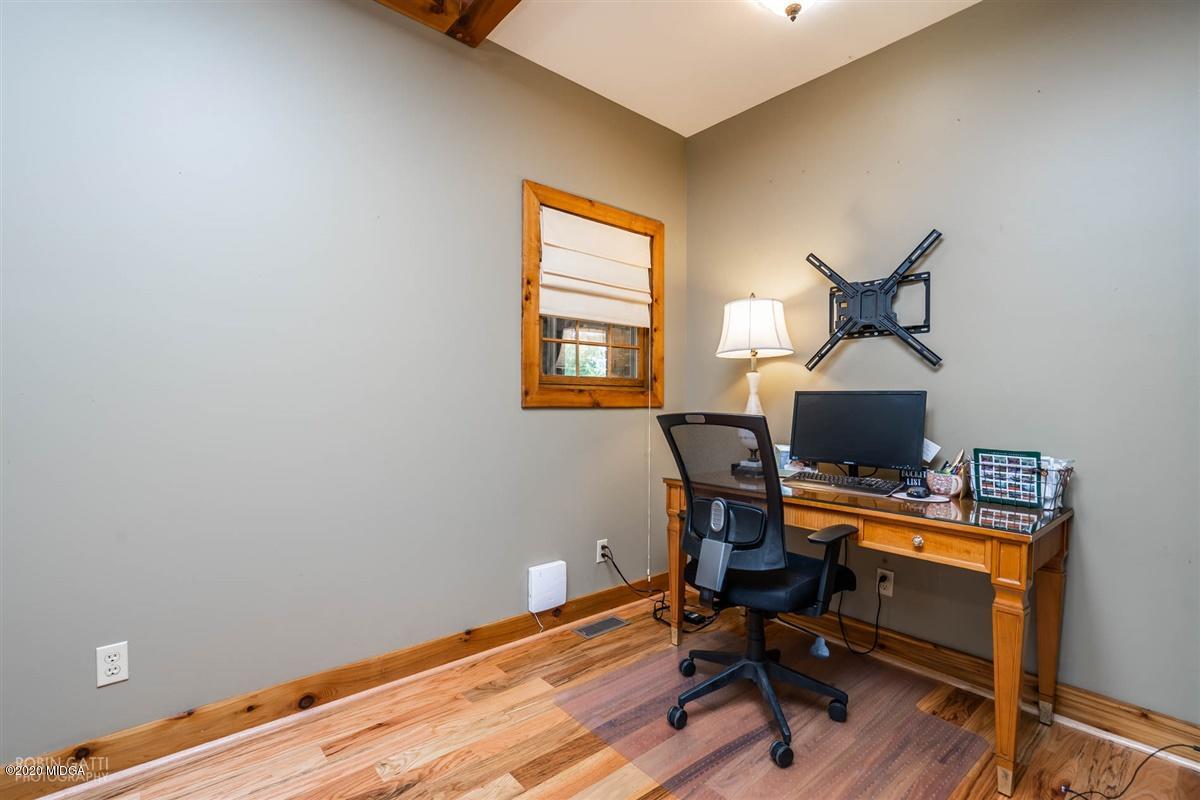 545 Gose Road Forsyth, GA 31029 - Photo 18 of 36 a view of a workspace with furniture and a window
