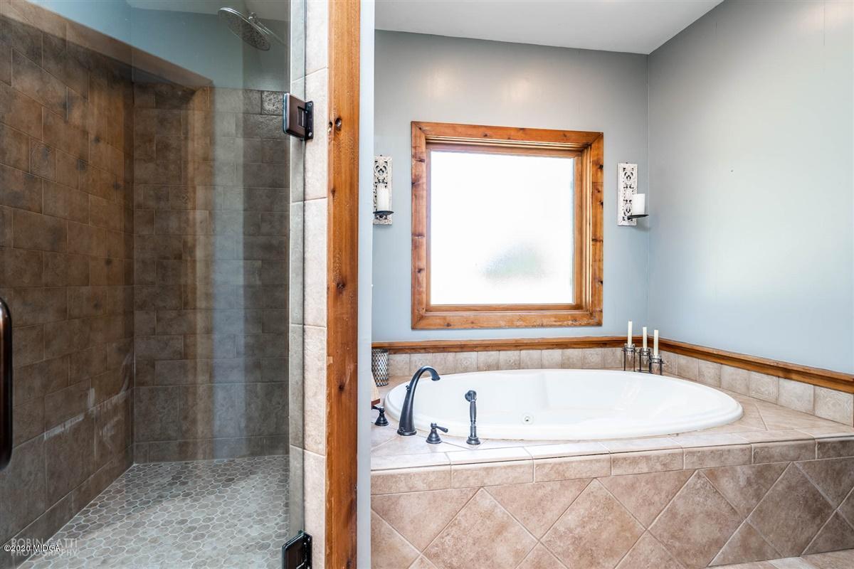545 Gose Road Forsyth, GA 31029 - Photo 20 of 36 a bathroom with shower and bathtub