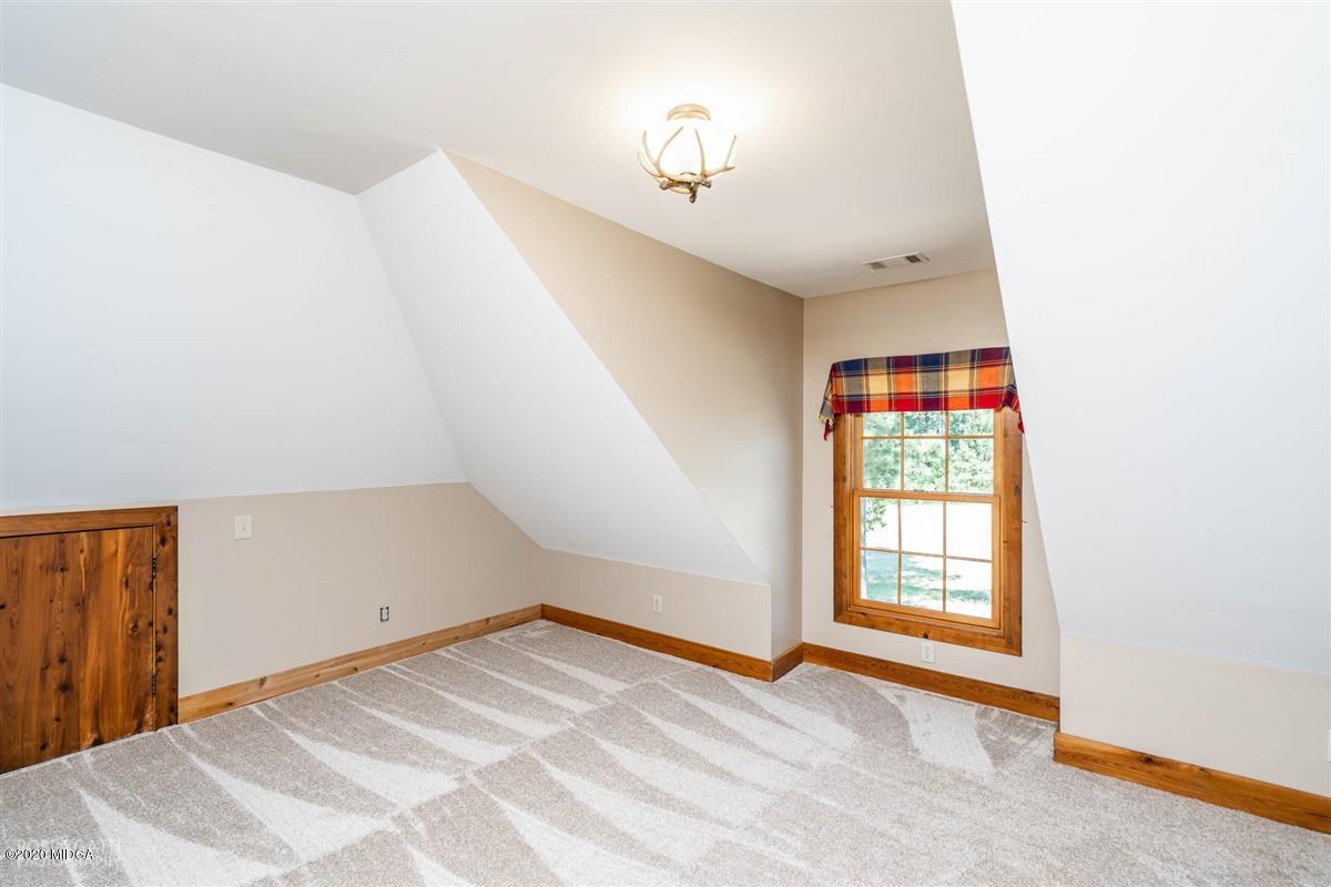 545 Gose Road Forsyth, GA 31029 - Photo 22 of 36 an empty room with windows