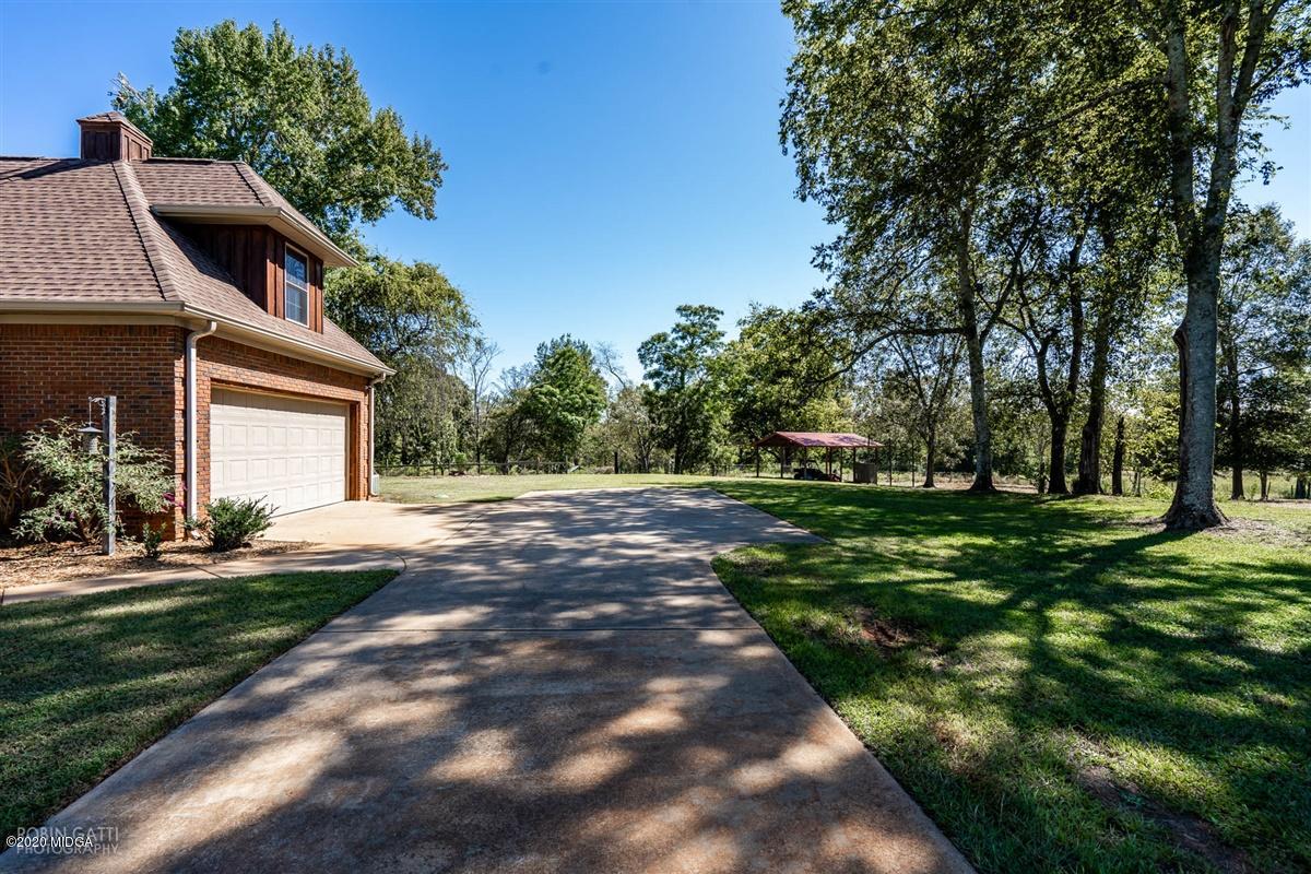 545 Gose Road Forsyth, GA 31029 - Photo 35 of 36 a front view of a house with a yard