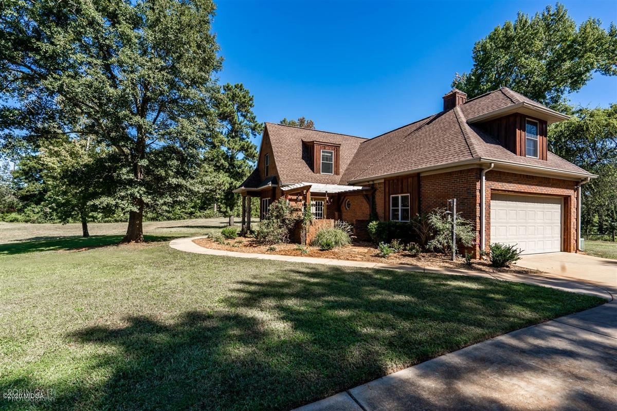 545 Gose Road Forsyth, GA 31029 - Photo 36 of 36 a front view of a house with a yard