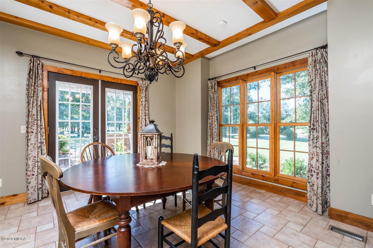 545 Gose Road Forsyth, GA 31029 - Photo 5 of 36 a view of a dining room with furniture window and outside view