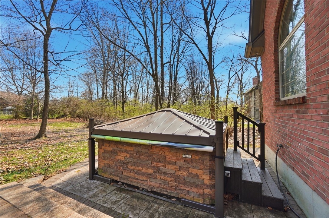 472 Timber Walk Court Springboro, OH 45066 - Photo 73 of 86 Enjoy outdoor relaxation with this inviting spa, nestled on a paved patio with serene views.