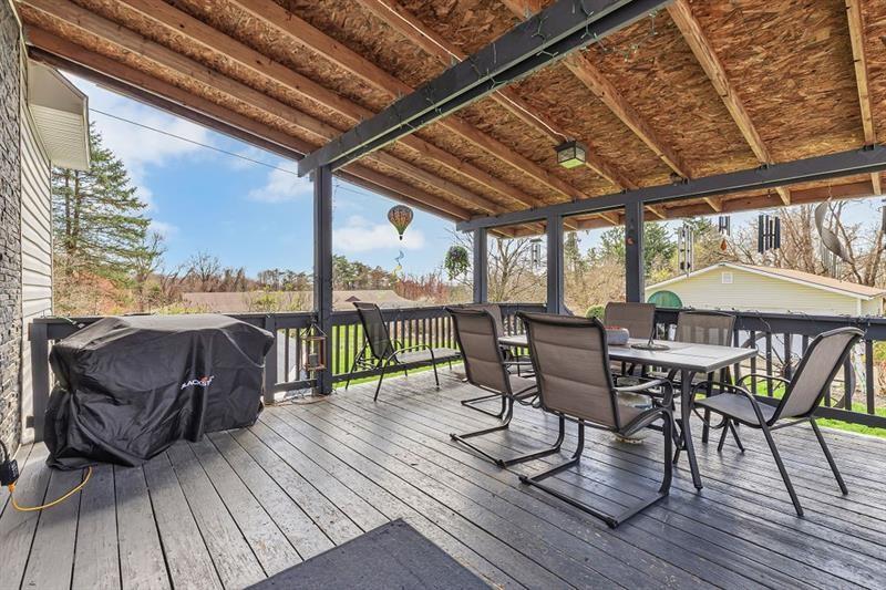 3159 Brodhead Road Aliquippa, PA 15001 - Photo 17 of 30 a view of a balcony with furniture and wooden floor