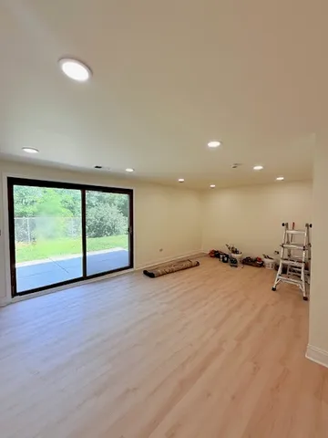 a view of a room with a large window