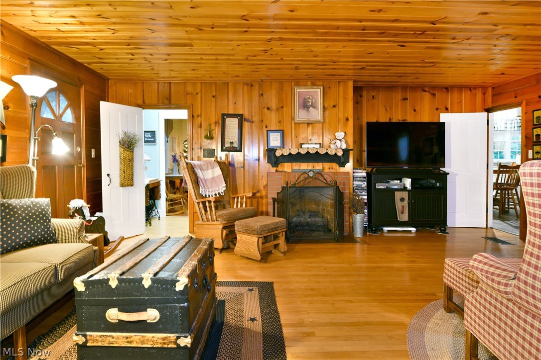 8683 King Graves Road Northeast Warren, OH 44484 - Photo 20 of 50 Interior space featuring extensive wood-paneled walls and ceiling