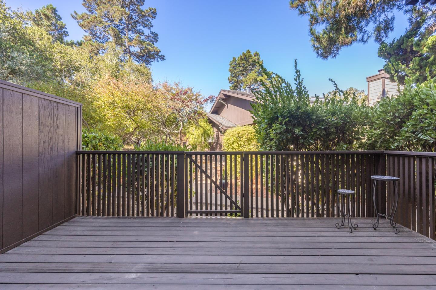 1360 Josselyn Canyon Road, Unit 40 Monterey, CA 93940 - Photo 18 of 18 a view of a wooden roof deck