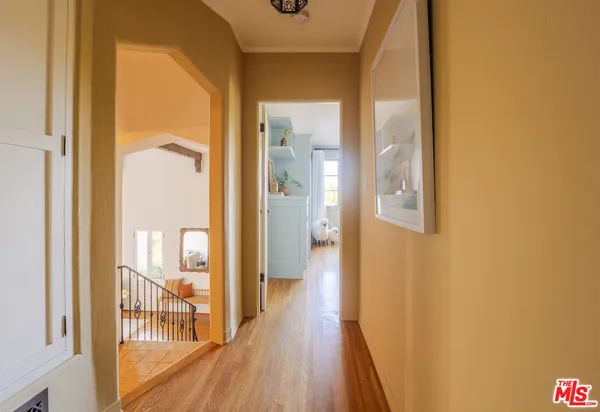 a view of a bathroom from a hallway