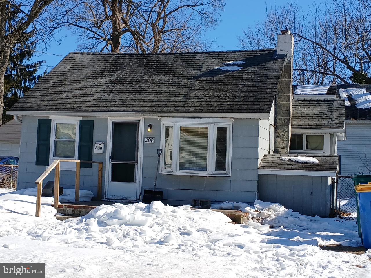 208 Neshaminy Road Croydon, PA 19021 - Photo 2 of 6 a view of house with snow on the road