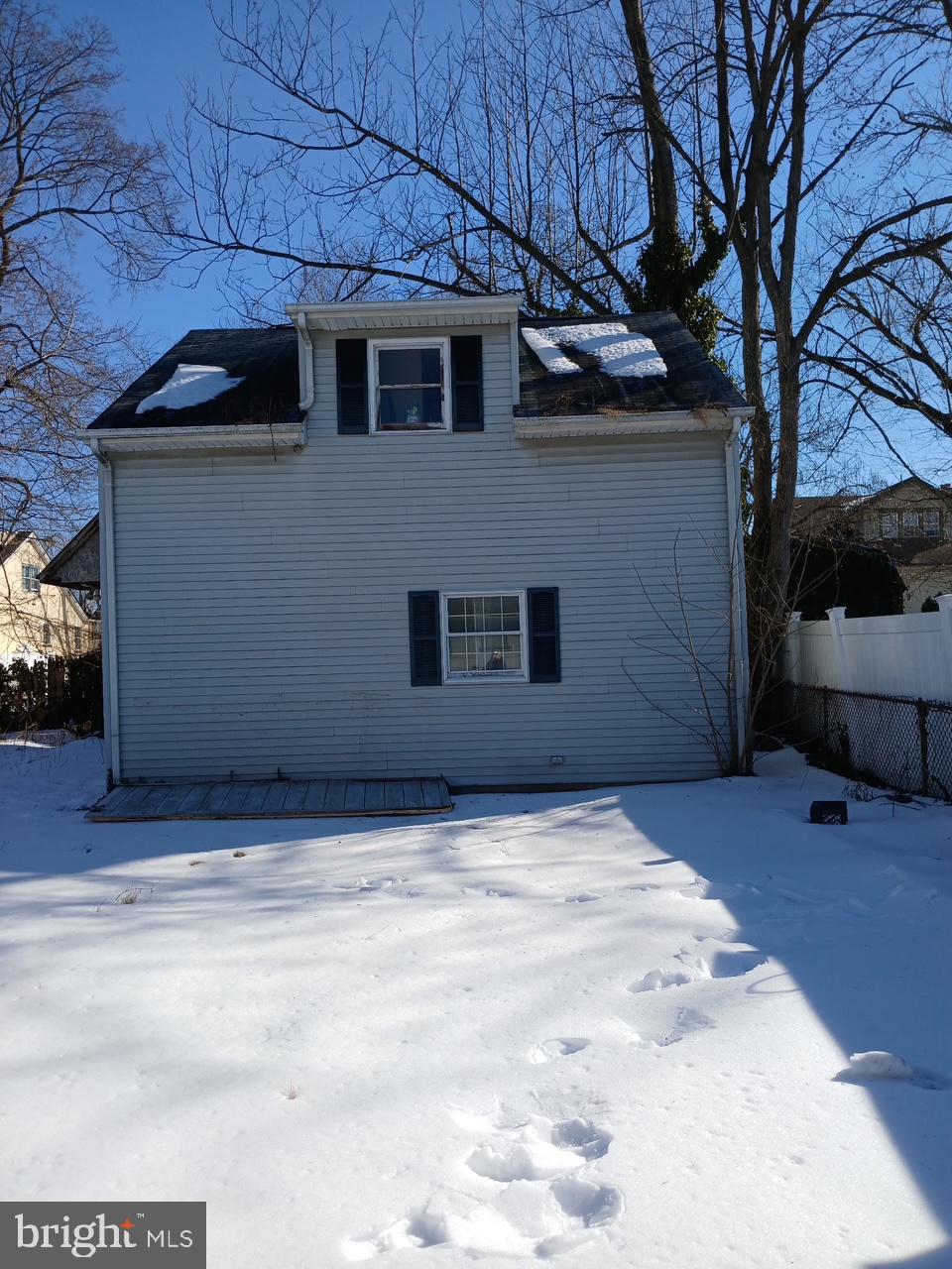 208 Neshaminy Road Croydon, PA 19021 - Photo 5 of 6 a house with trees in front of it