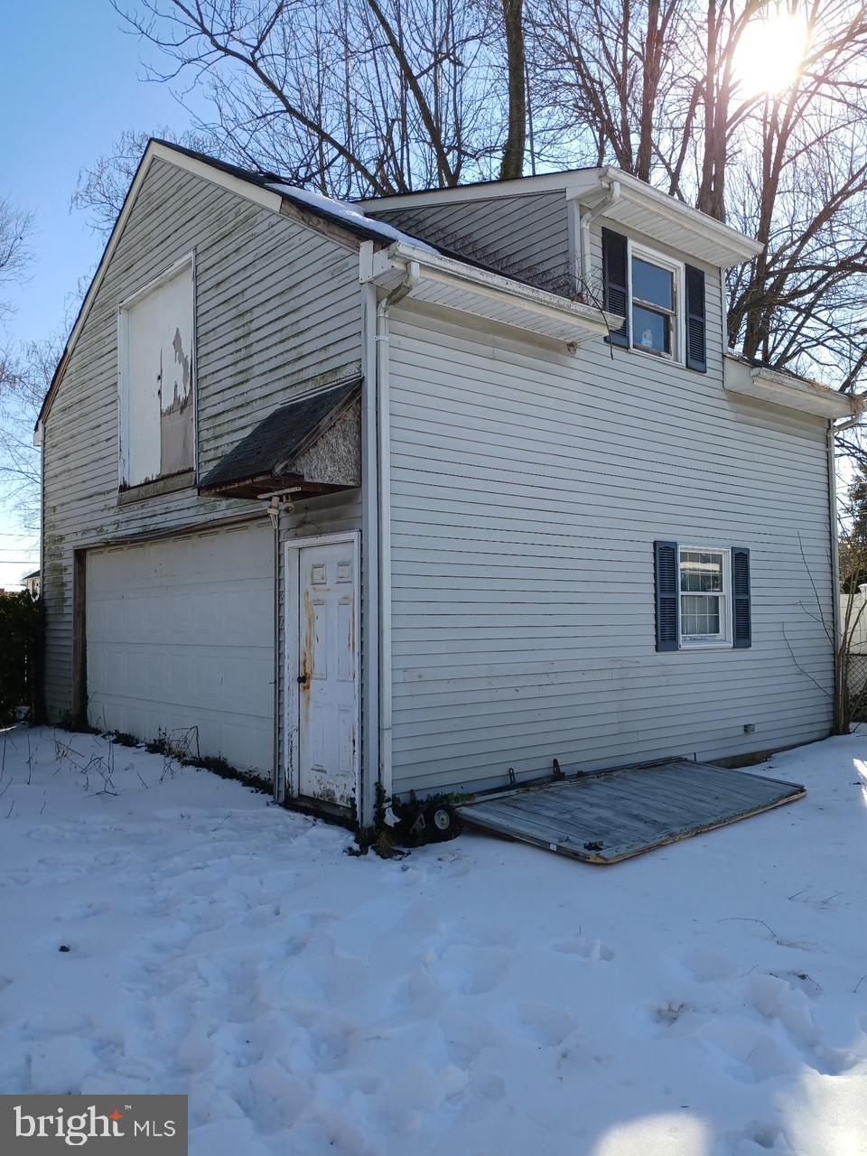 208 Neshaminy Road Croydon, PA 19021 - Photo 6 of 6 a view of a house with a garage