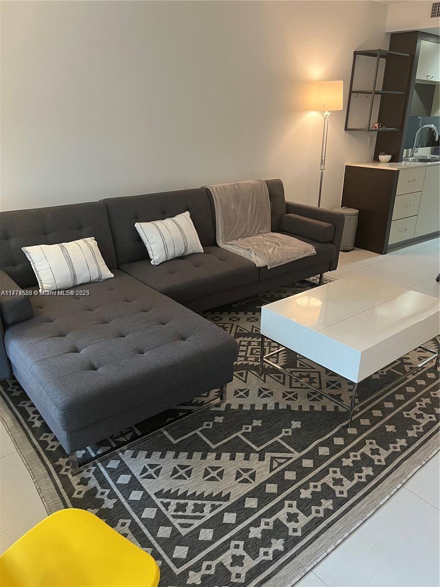 2130 Park Avenue, Unit 4 Miami Beach, FL 33139 - Photo 3 of 12 a living room with furniture