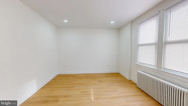 a view of a room with a window