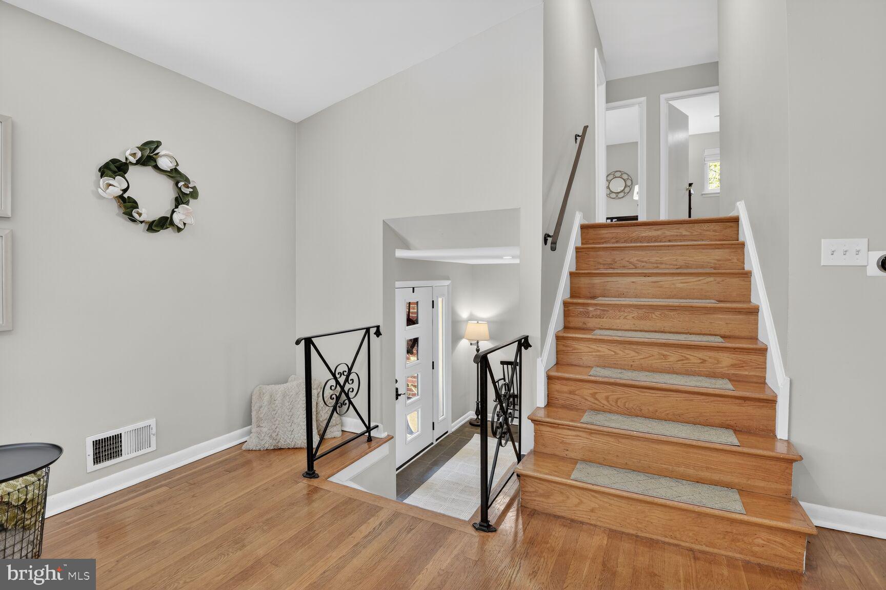 9900 Fernwood Road Bethesda, MD 20817 - Photo 20 of 39 a view of entryway and hall with wooden floor