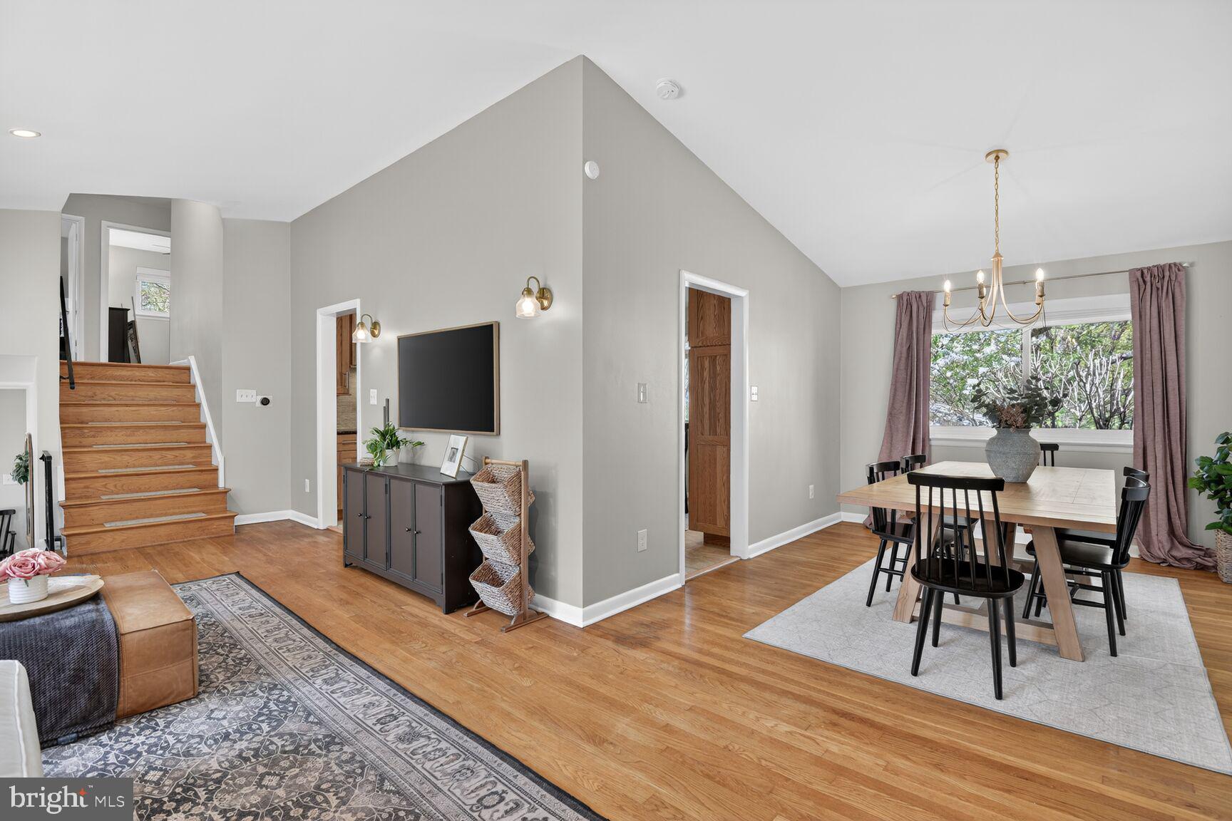 9900 Fernwood Road Bethesda, MD 20817 - Photo 8 of 39 a living room with furniture and a flat screen tv