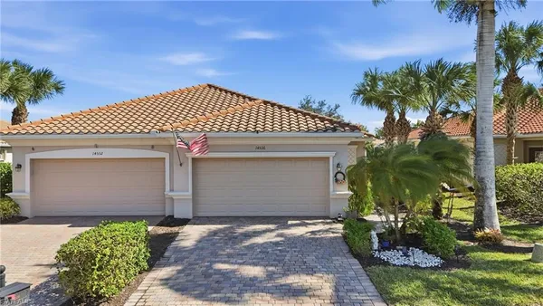 a front view of a house with a garage