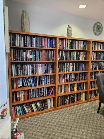 a view of a book shelf with lots of books
