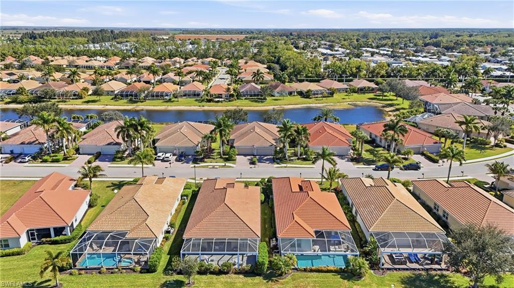 14536 Grapevine Drive Naples, FL 34114 - Photo 6 of 39 Aerial view of residential area with a large body of water