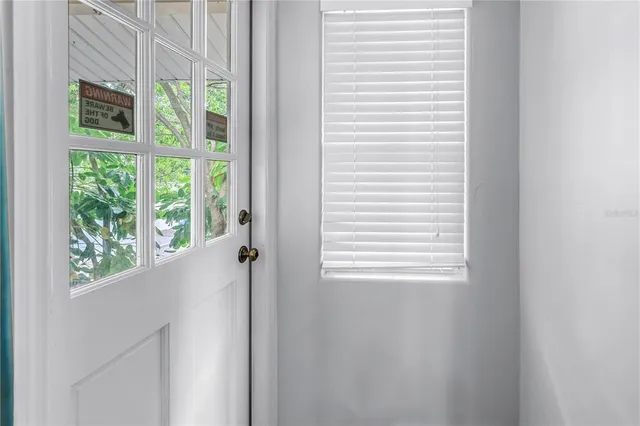 a view of a house with a yard and garage