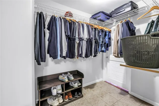 a view of a house with a patio and backyard