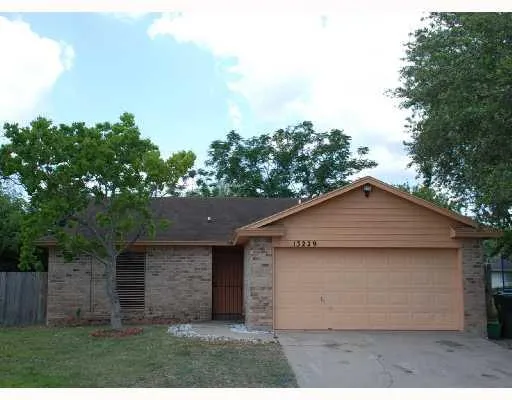 a view of a backyard of house